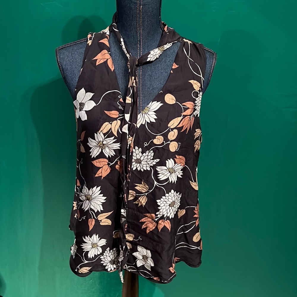 Great floral tank blouse under suits or alone